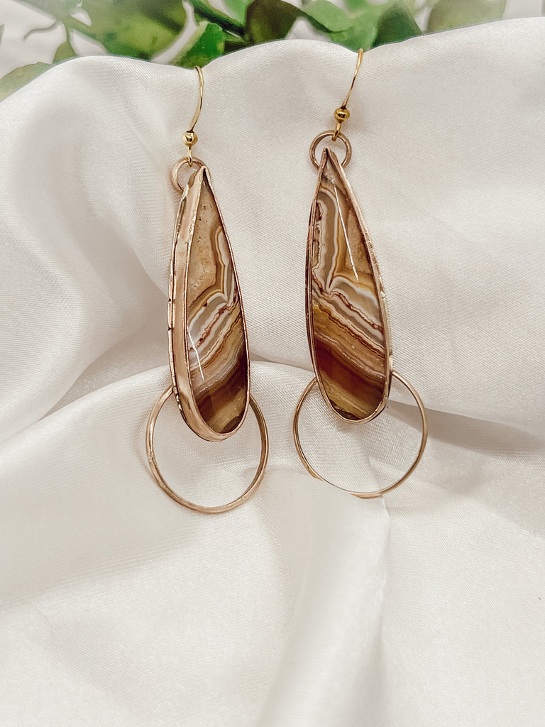 These 2-1/2” boho/western Jasper dangle earrings are made more stunning with the addition of shiny 14k goldfill embellishments. The nestled Jasper adds a pop of color, and the earring hooks are hypoallergenic for comfortable wear.